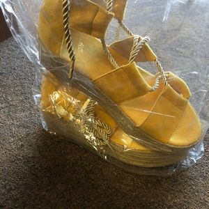 Size 10 , platform, tie around ankle ,yellow heels